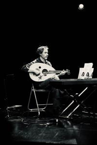 A creative on stage performing